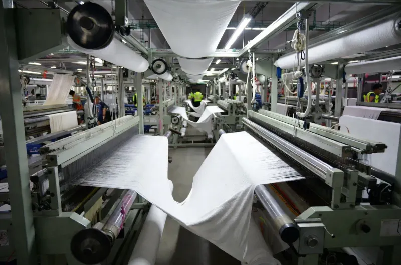 Towel production line with commercial looms in operation